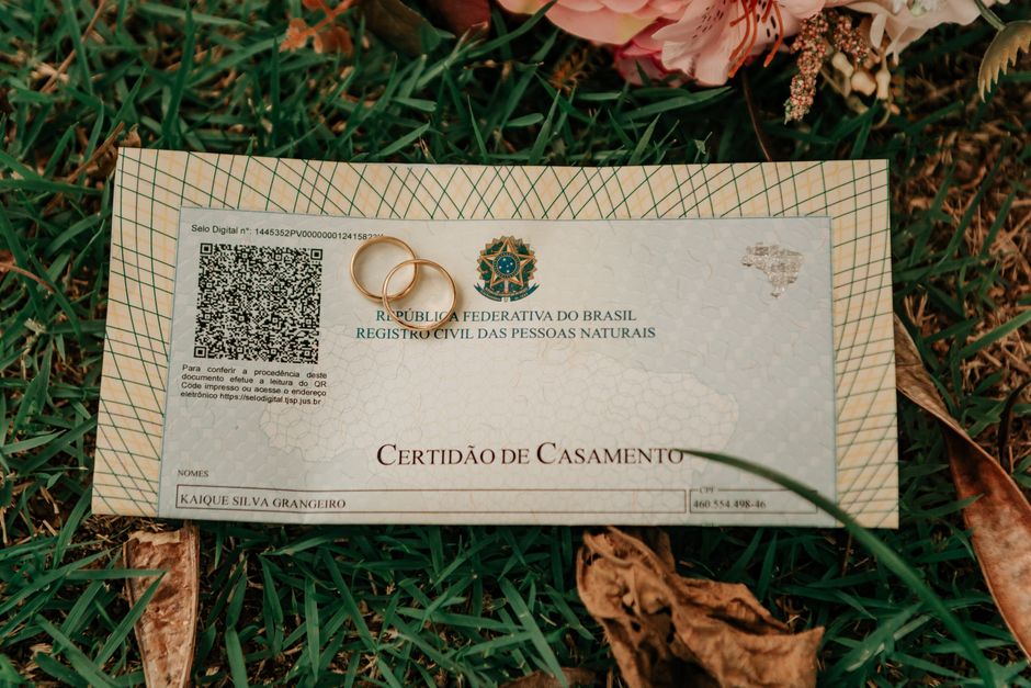 Official marriage certificate document with official stamps and rings